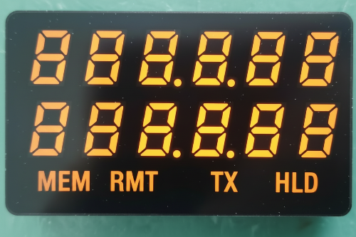 A close-up of a black industrial digital display module with orange LED digits showing '1888.8.